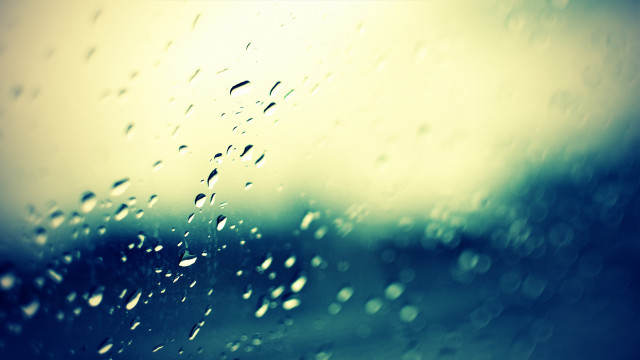 Rain covered window blurry background free wallpaper for desktop - medium preview image