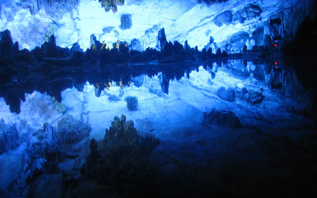 Lake mountains rocks sky reflection free wallpaper for desktop - medium preview image