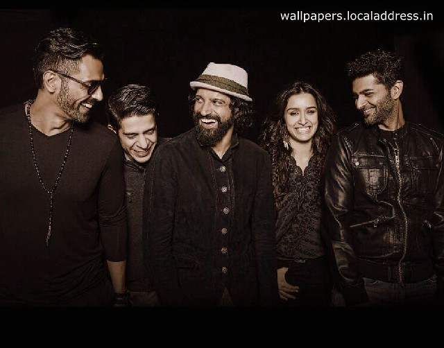 Group smiling camera black background free wallpaper for desktop - medium preview image