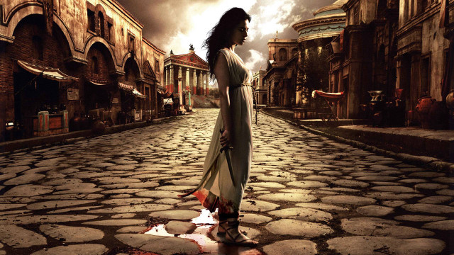 Woman cobblestone street city sky free wallpaper for desktop - medium preview image
