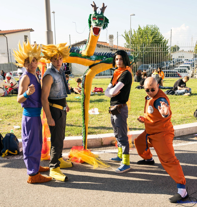 Dragon statue group costume street free wallpaper for tablet - medium preview image