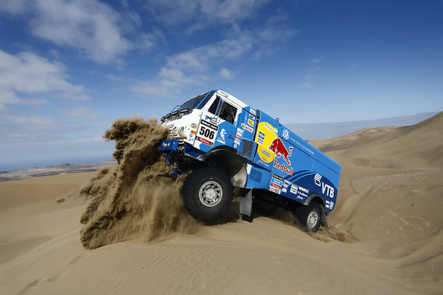 Truck driving sand dunes desert free wallpaper for desktop - medium preview image