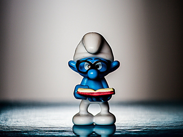 Toy figure table light background free wallpaper for desktop - medium preview image