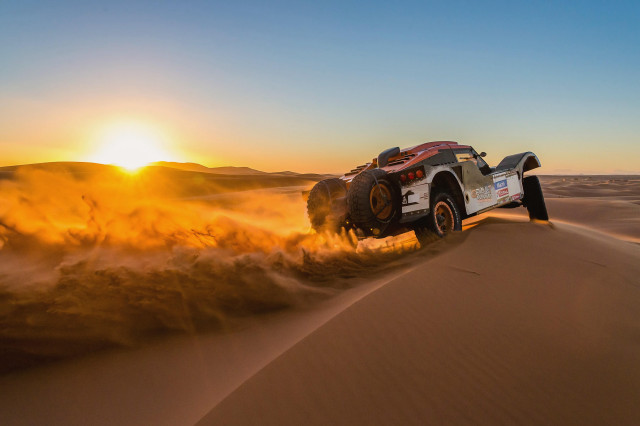 Truck desert sunset dust blowing free wallpaper for desktop - medium preview image