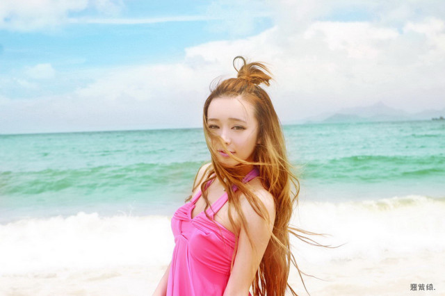 Woman pink dress beach ocean free wallpaper for desktop - medium preview image