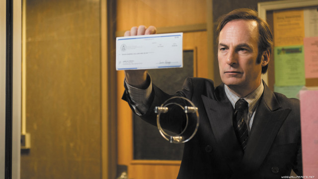 Man suit business card pointing free wallpaper for desktop - medium preview image