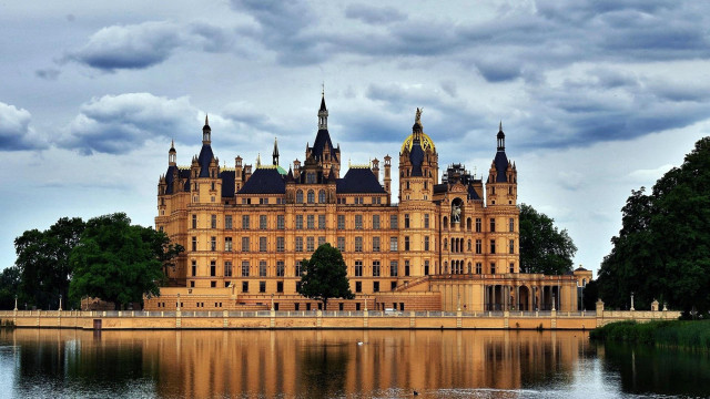 Large building towers water trees free wallpaper for desktop - medium preview image