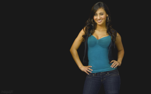 Woman blue top jeans posing free wallpaper for desktop - medium preview image