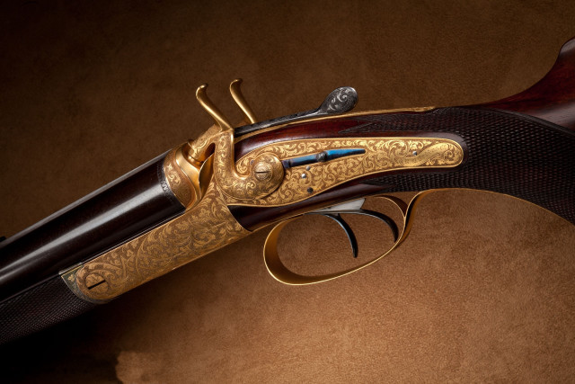 Gun closeup brown background black free wallpaper for desktop - medium preview image