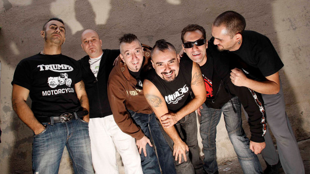 Men standing wall shadow cellphone free wallpaper for desktop - medium preview image