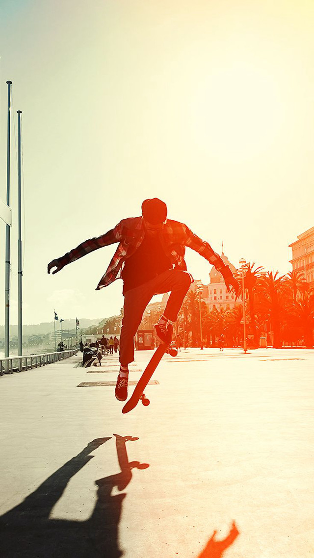Man skateboard trick air arms free wallpaper for mobile - medium preview image
