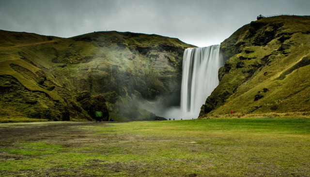 Waterfall person cloudy green field free wallpaper for desktop - medium preview image
