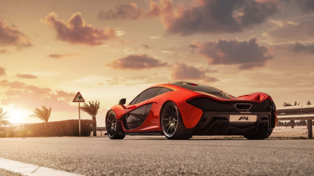 Red sports car sunset dawn free wallpaper for desktop - medium preview image