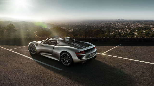 Silver sports car backlit city free wallpaper for desktop - medium preview image