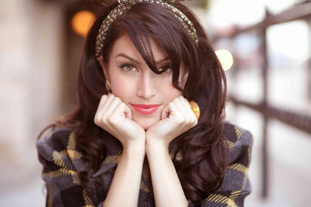 Woman headband posing hands face free wallpaper for desktop - medium preview image