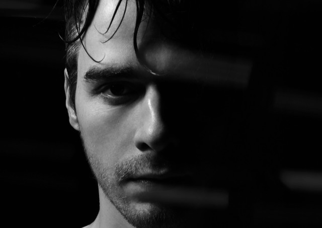 Messy hair serious look black free wallpaper for desktop - medium preview image