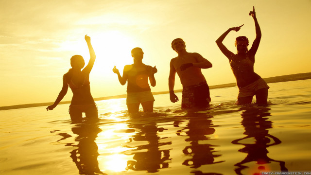 People standing water sunset sunrise free wallpaper for desktop - medium preview image