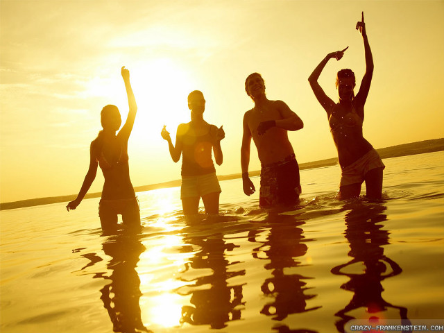 Group people water sunset sunrise free wallpaper for desktop - medium preview image