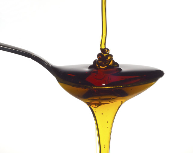 Spoon oil liquid pouring out free wallpaper for desktop - medium preview image
