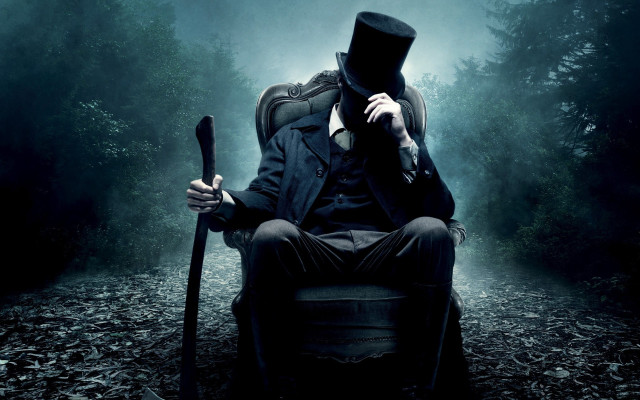 Man top hat coat sitting #4 free wallpaper for desktop - medium preview image