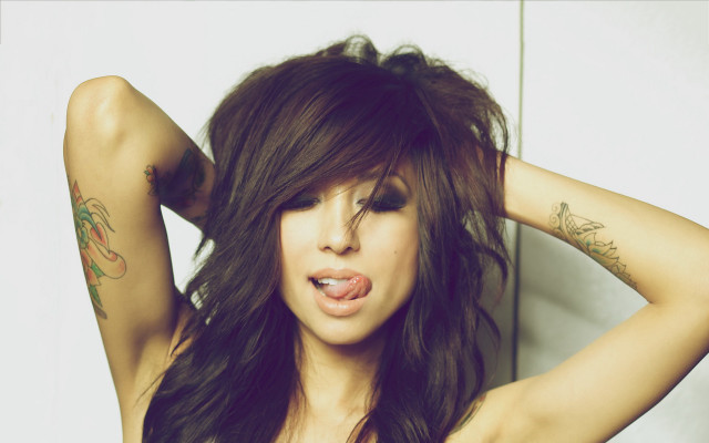 Tattooed woman pose purple hair free wallpaper for desktop - medium preview image