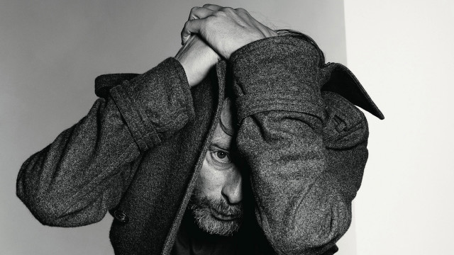 Man beard jacket covering face free wallpaper for desktop - medium preview image