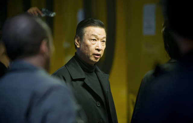 Man black coat crowd yellow free wallpaper for desktop - medium preview image