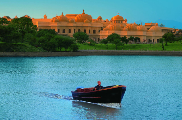 Man boat lake large building free wallpaper for desktop - medium preview image