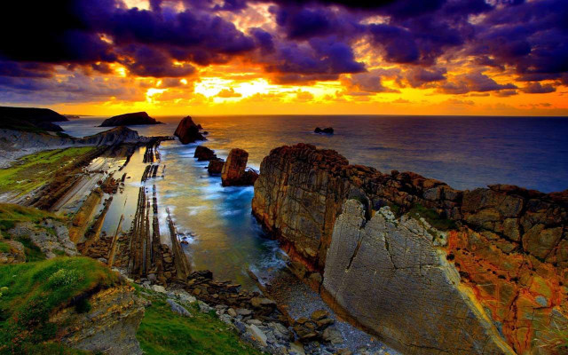 Sunset rocky beach water rock free wallpaper for desktop - medium preview image