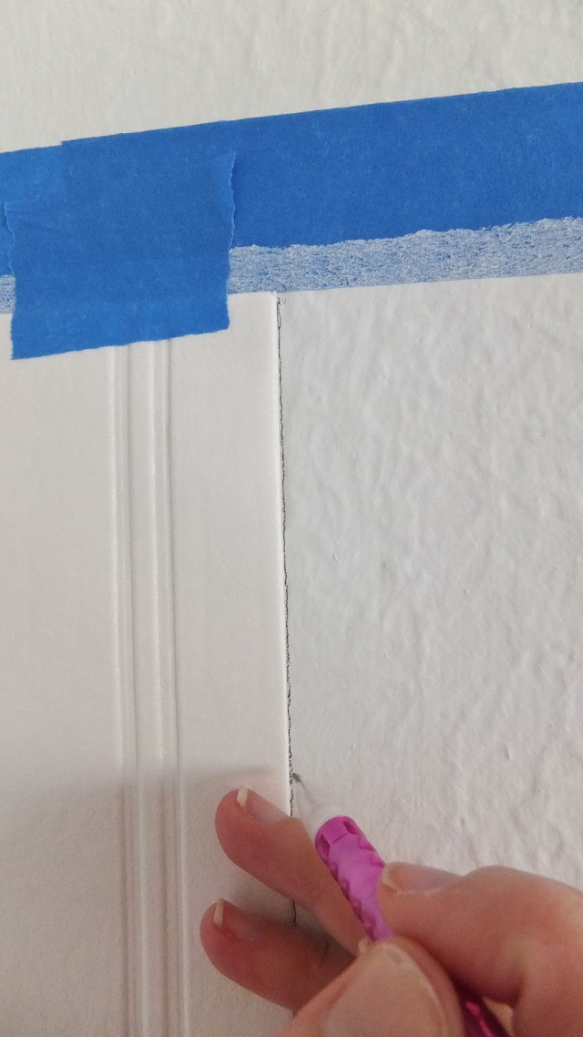 Person holding blue tape wall free wallpaper for mobile - medium preview image