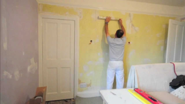 Man painting yellow room white free wallpaper for desktop - medium preview image