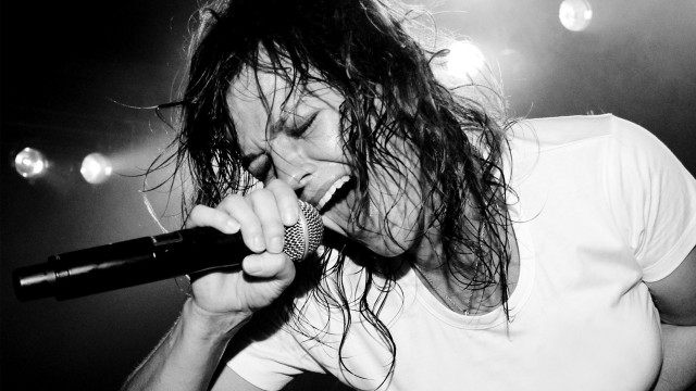 Woman wet hair singing microphone free wallpaper for desktop - medium preview image