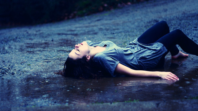 Woman laying rain eyes closed free wallpaper for desktop - medium preview image