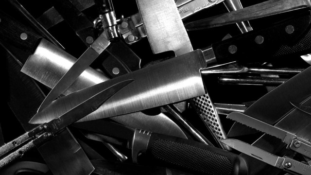 Pile knives black white photo free wallpaper for desktop - medium preview image