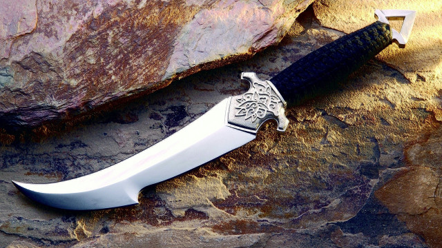 Celtic knife rock holder design free wallpaper for desktop - medium preview image