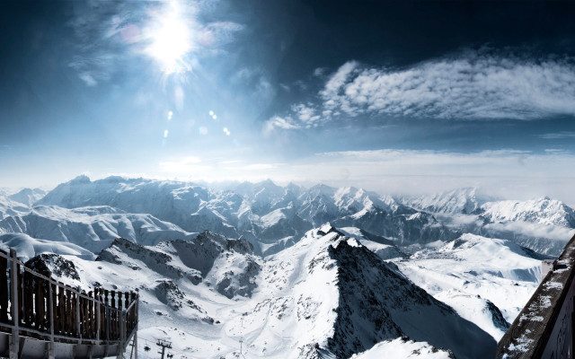 Mountain range fence snow sun free wallpaper for desktop - medium preview image
