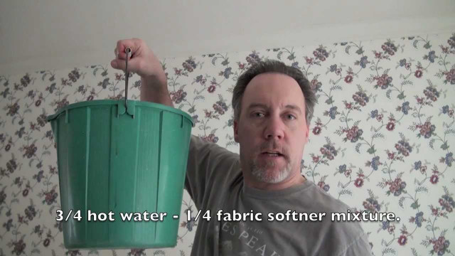 Man holding green bucket flowered free wallpaper for desktop - medium preview image