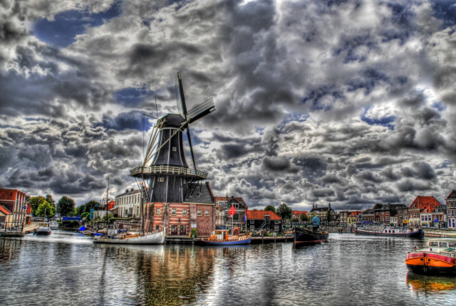 Windmill water boats cloudy sky free wallpaper for desktop - medium preview image