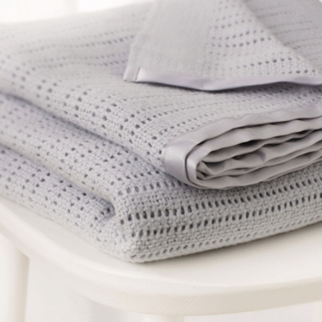 Stack folded blankets white table free wallpaper for tablet - medium preview image