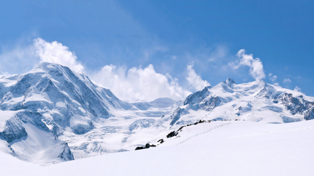 Skiing mountain snowy view person free wallpaper for desktop - medium preview image