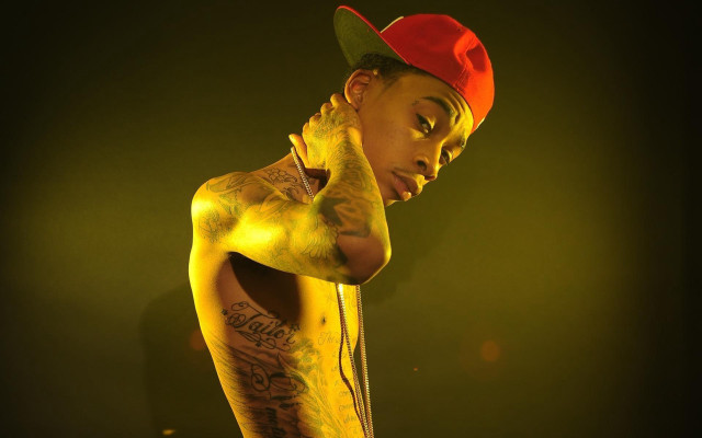 Man tattoos red hat arm free wallpaper for desktop - medium preview image