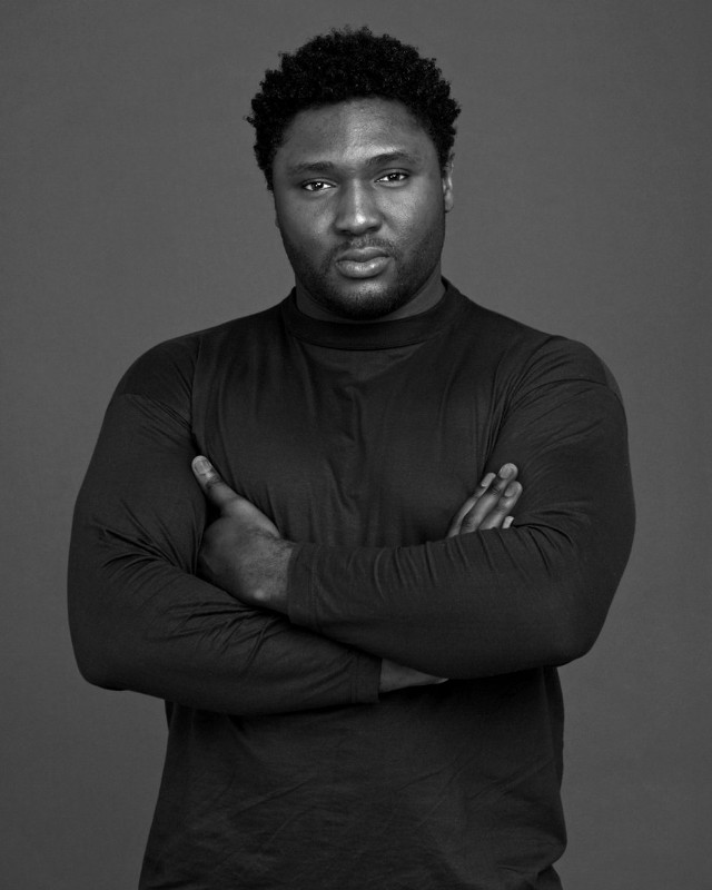 Man arms crossed posing black free wallpaper for mobile - medium preview image