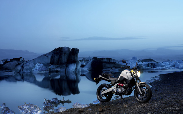Motorcycle rocky shore water icebergs free wallpaper for desktop - medium preview image