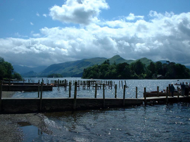 Docked people mountains clouds lake free wallpaper for desktop - medium preview image