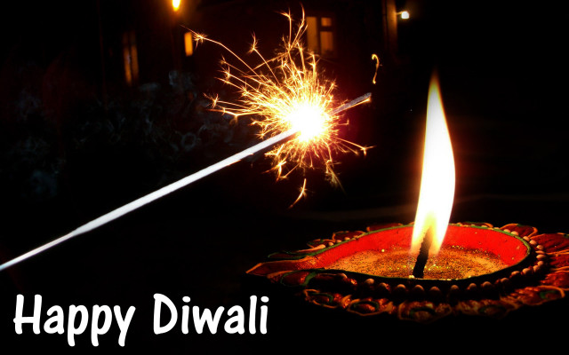 Lit diwali sparkler black background free wallpaper for desktop - medium preview image