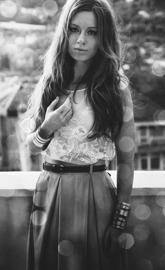 Woman balcony serious look camera free wallpaper for mobile - medium preview image