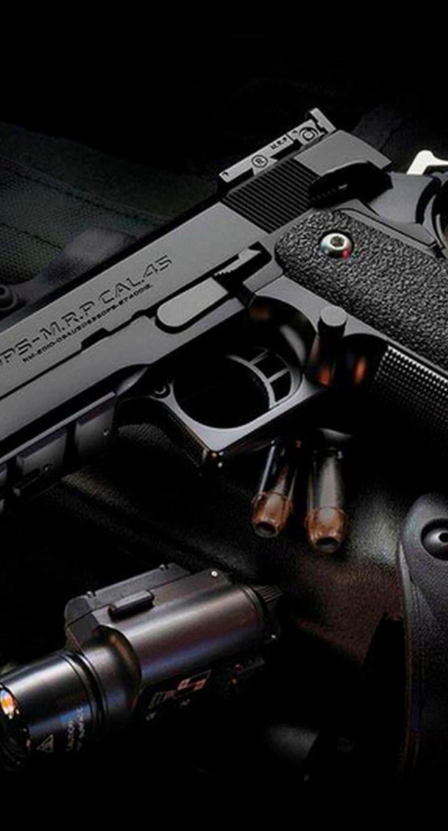 Gun flashlight ground next to free wallpaper for mobile - medium preview image