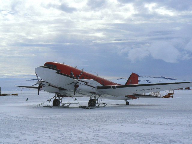 Small airplane snow covered field free wallpaper for desktop - medium preview image