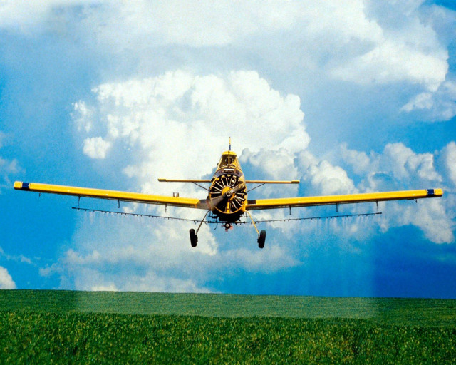 Yellow airplane cloudy sky green #3 free wallpaper for desktop - medium preview image