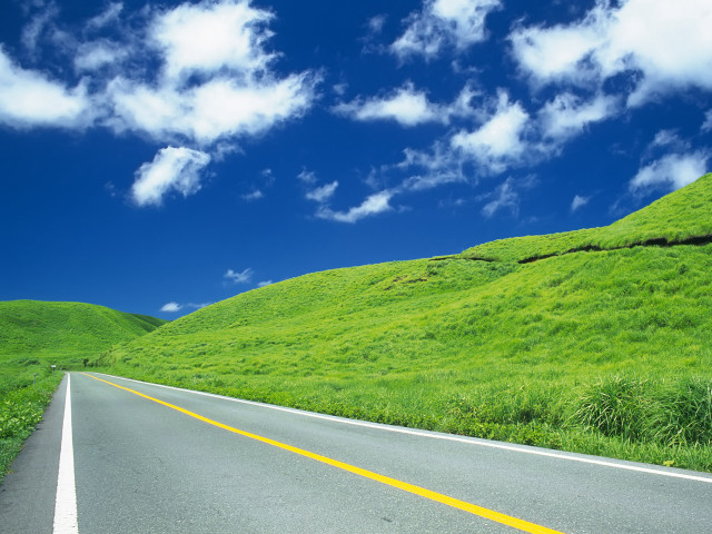 Lush green hillside road blue #2 free wallpaper for desktop - medium preview image